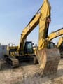 2024 Caterpillar 320GX crawler excavator, front three-quarter view