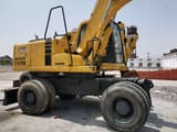 2015 Komatsu PW150-6 wheeled excavator side view