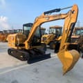 2023 Caterpillar 306E2 mini excavator, three-quarter view