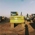 2024 Komatsu PC70-8 mini excavator, rear view