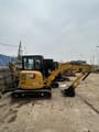 2023 Caterpillar 303.5E mini excavator, side view