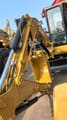2022 Caterpillar 304 crawler excavator boom and cab view