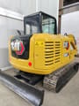 2022 Caterpillar 306E2 mini excavator, rear three-quarter view