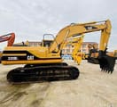 2015 Caterpillar 320BL crawler excavator, side view