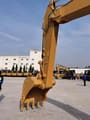 2020 Caterpillar 320GX crawler excavator boom and bucket detail