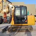 2023 Caterpillar 305.5E mini excavator, side profile view