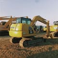 2024 Komatsu PC70-8 mini excavator, rear three-quarter view