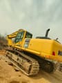 2022 Komatsu PC500 LC crawler excavator, rear three-quarter view