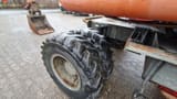 1990 Atlas 1604K wheel excavator dual tire and bucket view