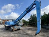 1999 Fuchs MHL340 material handler, side view