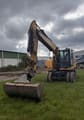 2020 Caterpillar M315F wheel excavator, front three-quarter view
