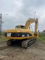 2021 Caterpillar 320C crawler excavator rear three-quarter view