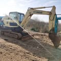 2023 Hyundai R60-9 mini excavator, side profile view