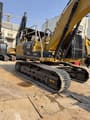 2025 Caterpillar 330D L crawler excavator, rear three-quarter view
