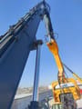 2020 Hyundai 395VS excavator boom and pile driver attachment