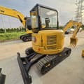2022 Caterpillar 303.5E mini excavator rear three-quarter view
