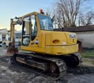 2006 Komatsu PC110 crawler excavator, rear three-quarter view