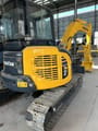 2023 Komatsu PC-55MR mini excavator, front three-quarter view