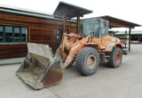 2010 Doosan DL200 wheel loader, front three-quarter view