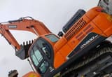 2025 Doosan DX200.9C crawler excavator, low angle side view