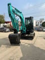 2013 Kobelco SK55SR mini excavator, front three-quarter view