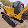 2022 Caterpillar 306D mini excavator, rear three-quarter view