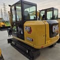 2024 Caterpillar 306E2 mini excavator, rear three-quarter view