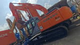 2023 Hitachi ZX450 crawler excavator, rear three-quarter view
