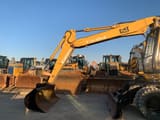 2000 Caterpillar M315 wheel excavator, side profile view