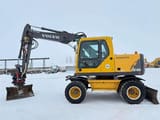 2004 Volvo EW140B wheel excavator, side view