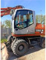 2006 Atlas 1305 M wheel excavator side view