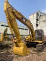 2008 Caterpillar 320BL crawler excavator, front three-quarter view