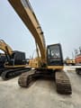 2008 Caterpillar 320D crawler excavator, front-quarter view