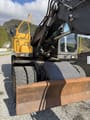 2009 Volvo EW140C wheel excavator front view