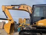 2010 Caterpillar 320D crawler excavator side view