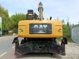 2010 Caterpillar M322D Material Handler