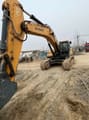 2013 Hyundai crawler excavator, front three-quarter view