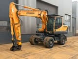 2014 Hyundai R180W-9A wheel excavator, side view