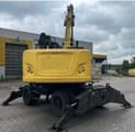 2015 Caterpillar 302.2 material handler, rear view