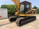 2015 Caterpillar 320BL crawler excavator, side view