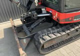 2015 Div ES57ZT mini excavator, close-up of undercarriage and blade