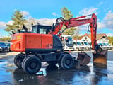 2015 Hitachi Zaxis 140W wheel excavator, side view