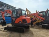 2016 Doosan DX60 crawler excavator, side view