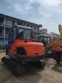 2016 Doosan DX60 crawler excavator, rear three-quarter view