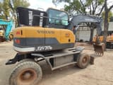 2016 Volvo LG670BM wheel excavator, rear three-quarter view
