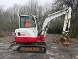 2018 Takeuchi TB230 mini excavator, side profile view