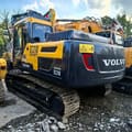 2018 Volvo EC210 crawler excavator, rear three-quarter view