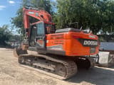 2019 Doosan DX225LC-5 crawler excavator, rear three-quarter view