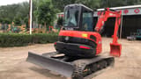 2019 Kubota U55-4 mini excavator, front three-quarter view