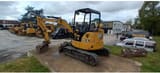 2020 Caterpillar 303.5E CR crawler excavator, rear three-quarter view